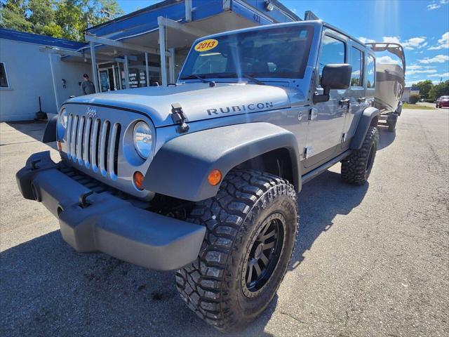 used 2013 Jeep Wrangler Unlimited car, priced at $18,550