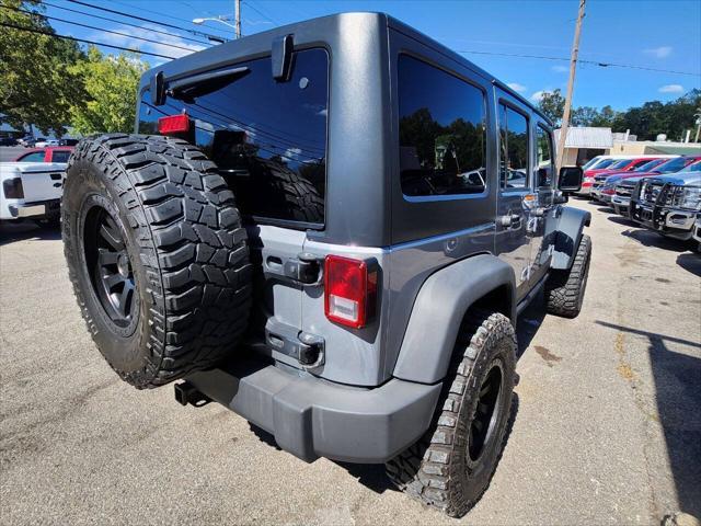 used 2013 Jeep Wrangler Unlimited car, priced at $18,550