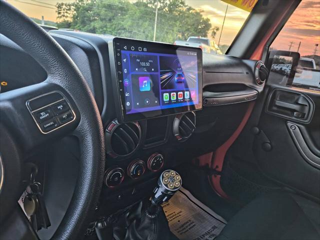 used 2015 Jeep Wrangler Unlimited car, priced at $22,900