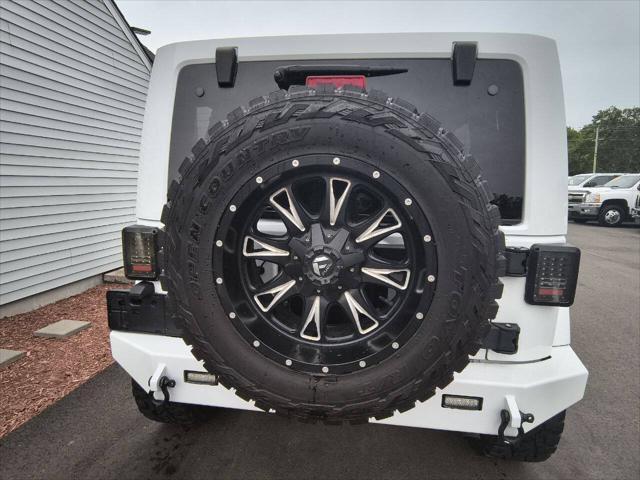 used 2014 Jeep Wrangler Unlimited car, priced at $22,900
