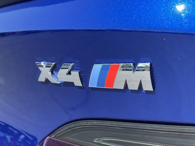 used 2022 BMW X4 M car, priced at $56,997