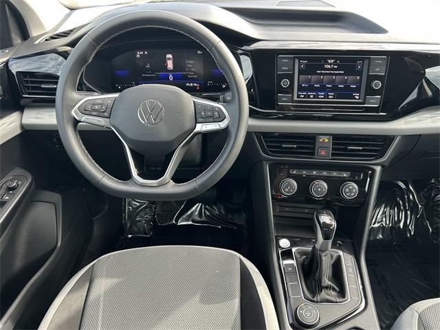 used 2023 Volkswagen Taos car, priced at $23,444