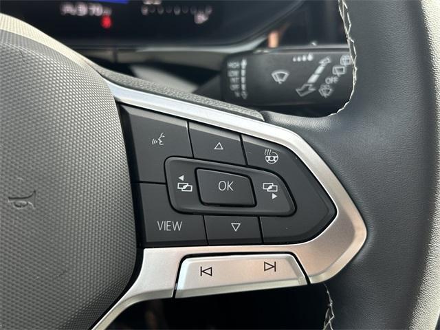 used 2023 Volkswagen Taos car, priced at $23,444