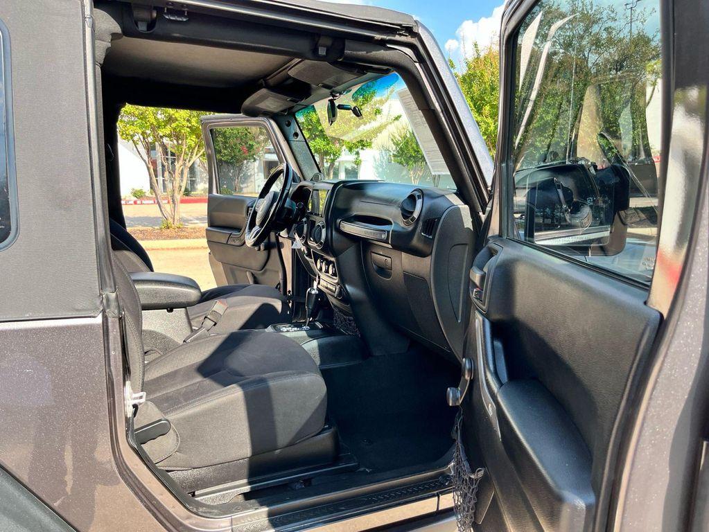 used 2014 Jeep Wrangler car, priced at $13,975