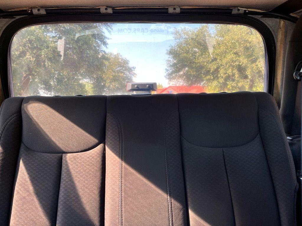used 2014 Jeep Wrangler car, priced at $13,975