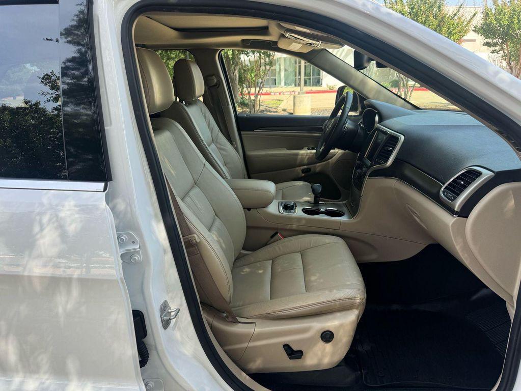 used 2014 Jeep Grand Cherokee car, priced at $13,975