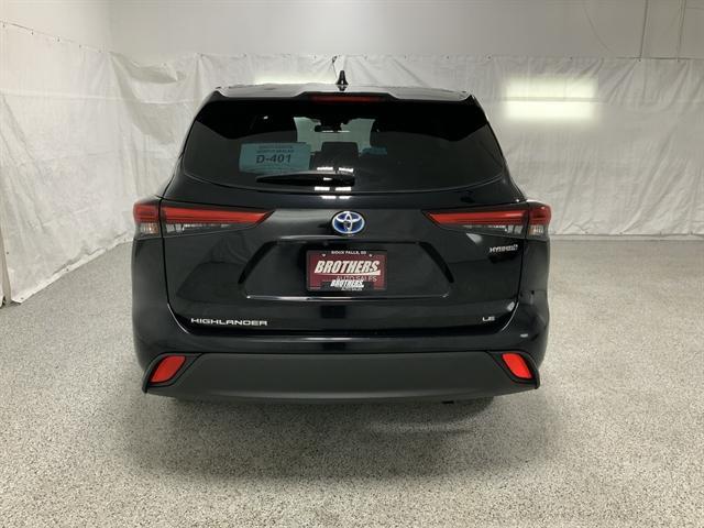 used 2021 Toyota Highlander Hybrid car, priced at $30,490