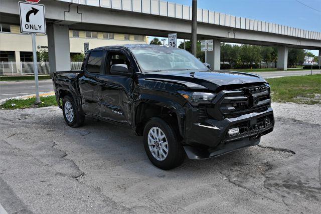 used 2024 Toyota Tacoma car, priced at $11,480