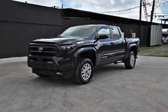 used 2024 Toyota Tacoma car, priced at $15,980