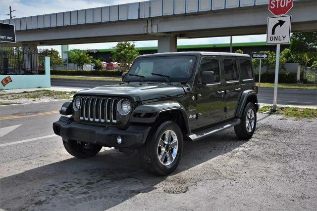 used 2022 Jeep Wrangler Unlimited car, priced at $12,980