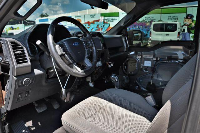 used 2018 Ford F-150 car, priced at $9,880