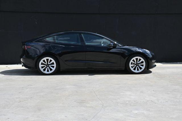 used 2022 Tesla Model 3 car, priced at $11,000
