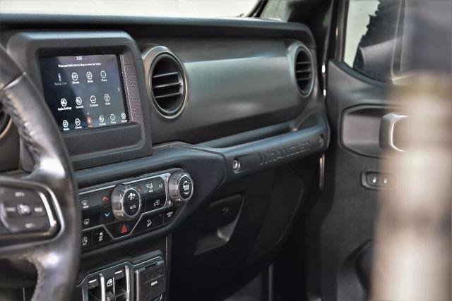 used 2021 Jeep Wrangler Unlimited car, priced at $12,980