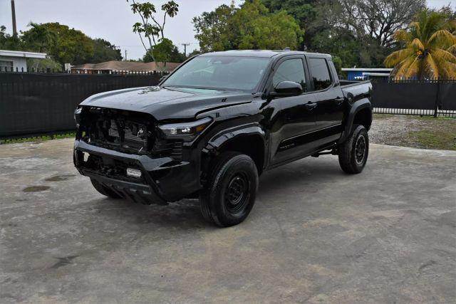 used 2024 Toyota Tacoma car, priced at $15,980