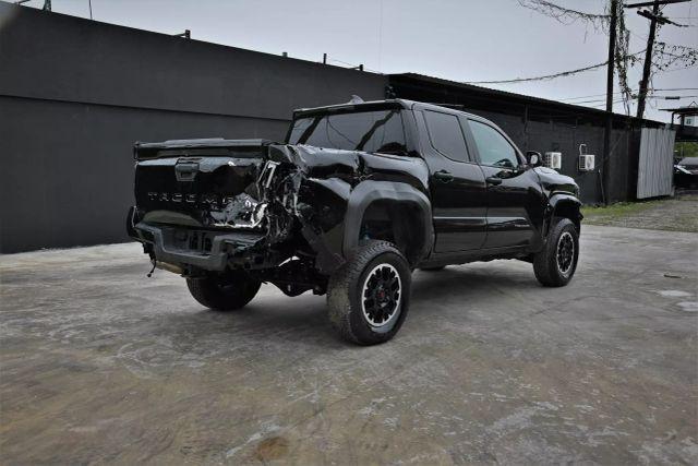 used 2024 Toyota Tacoma car, priced at $15,980