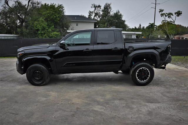 used 2024 Toyota Tacoma car, priced at $15,980