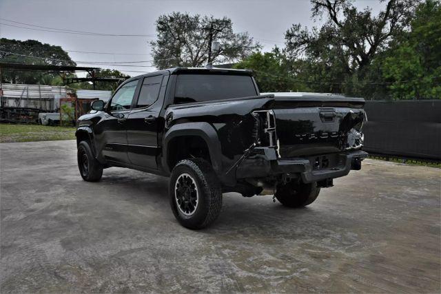 used 2024 Toyota Tacoma car, priced at $15,980