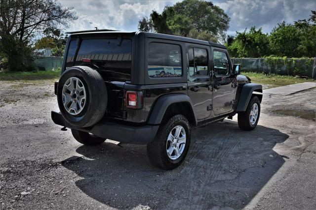 used 2022 Jeep Wrangler Unlimited car, priced at $13,980