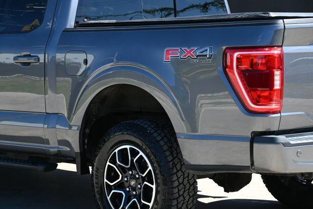 used 2021 Ford F-150 car, priced at $16,500