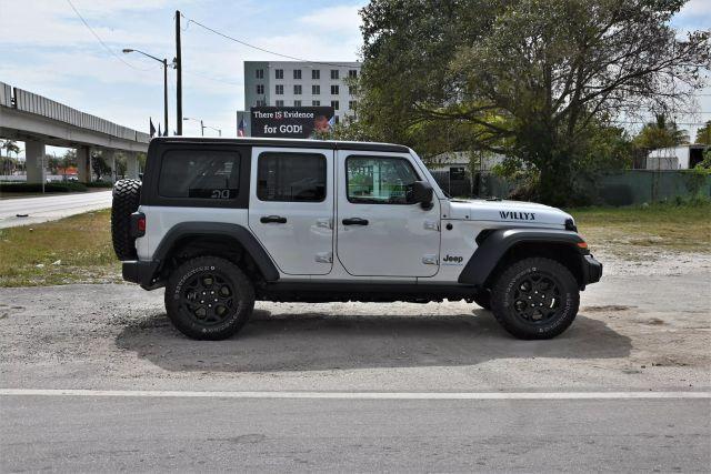 used 2023 Jeep Wrangler 4xe car, priced at $18,980