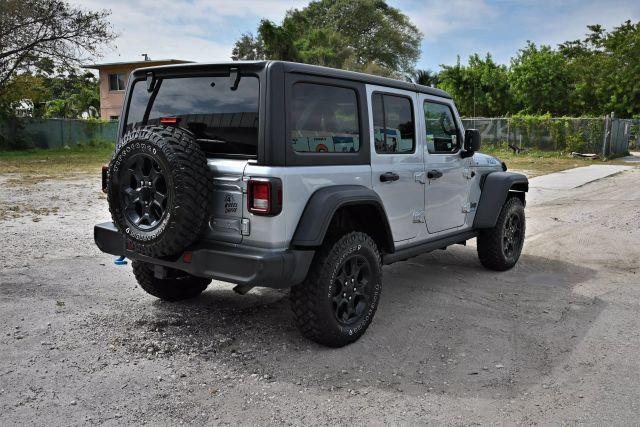 used 2023 Jeep Wrangler 4xe car, priced at $18,980