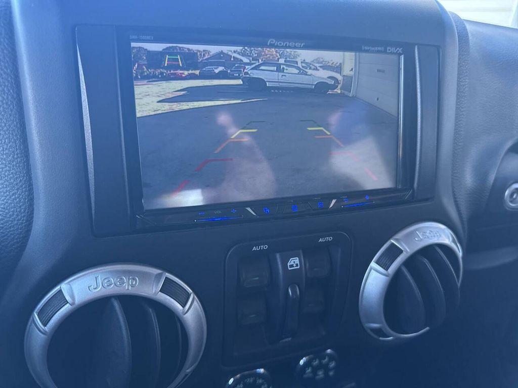 used 2015 Jeep Wrangler Unlimited car, priced at $18,975