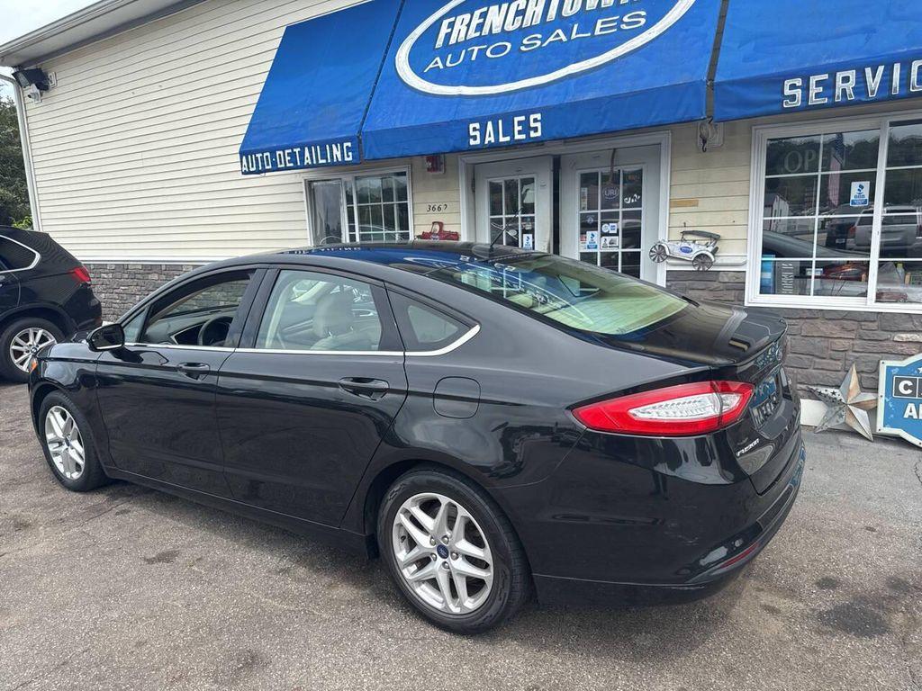 used 2013 Ford Fusion car, priced at $5,995