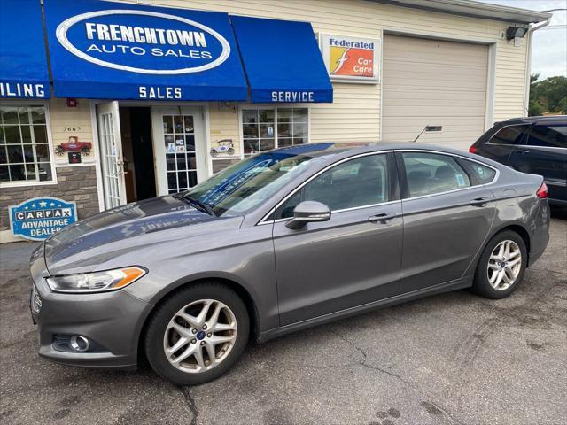 used 2013 Ford Fusion car, priced at $6,950