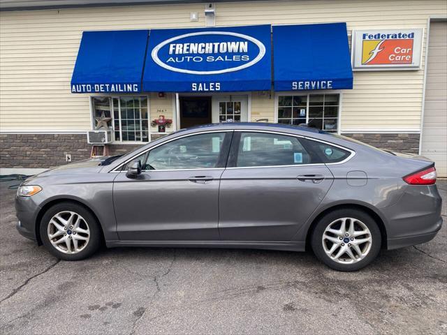 used 2013 Ford Fusion car, priced at $6,950