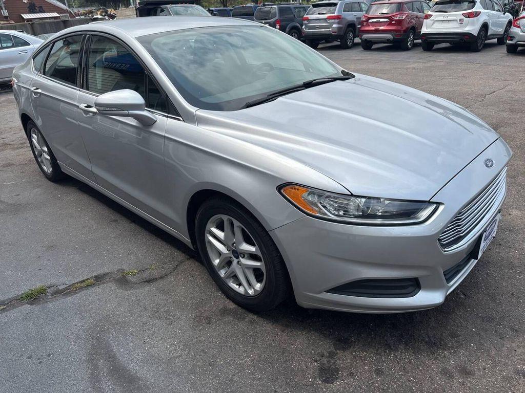 used 2014 Ford Fusion car, priced at $7,998