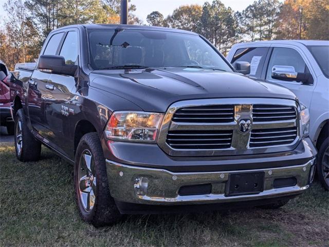 used 2018 Ram 1500 car, priced at $19,244
