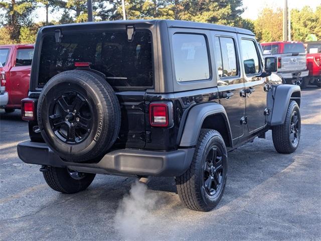 used 2023 Jeep Wrangler car, priced at $28,204