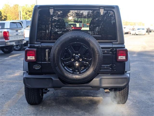 used 2023 Jeep Wrangler car, priced at $28,204