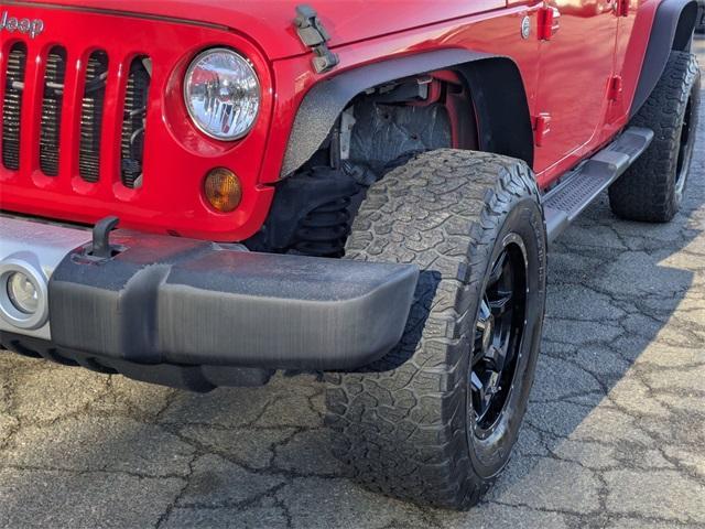 used 2013 Jeep Wrangler Unlimited car, priced at $16,809