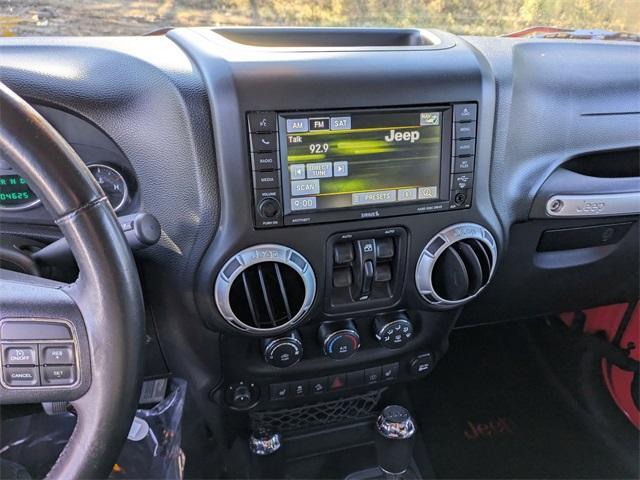 used 2013 Jeep Wrangler Unlimited car, priced at $16,809