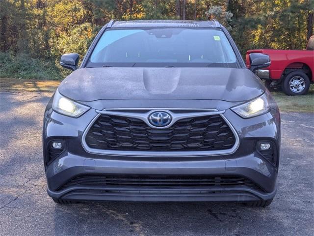 used 2021 Toyota Highlander Hybrid car, priced at $28,896