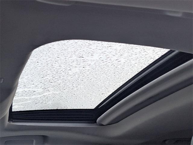 used 2021 Toyota Highlander Hybrid car, priced at $28,896