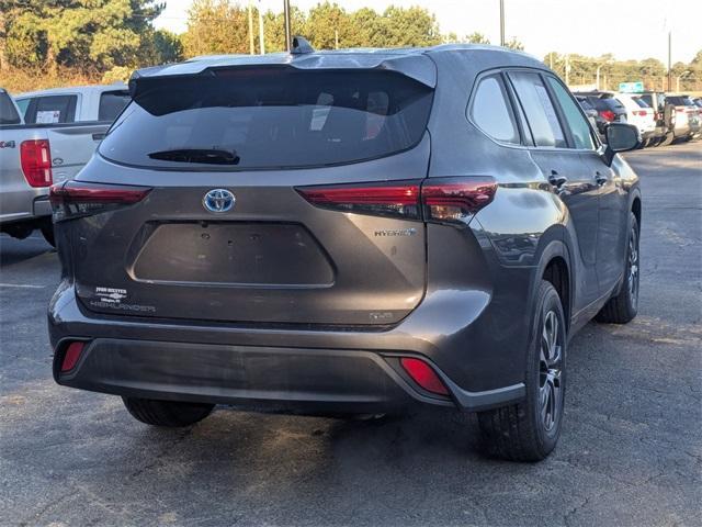 used 2021 Toyota Highlander Hybrid car, priced at $28,896