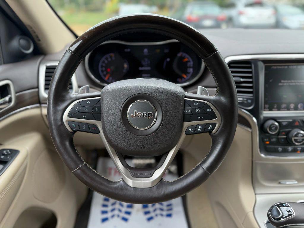used 2014 Jeep Grand Cherokee car, priced at $14,995