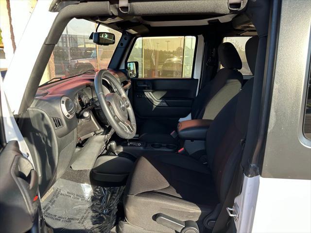 used 2015 Jeep Wrangler car, priced at $22,998