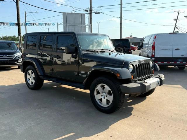 used 2010 Jeep Wrangler Unlimited car, priced at $13,497