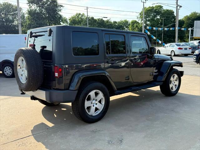 used 2010 Jeep Wrangler Unlimited car, priced at $13,497