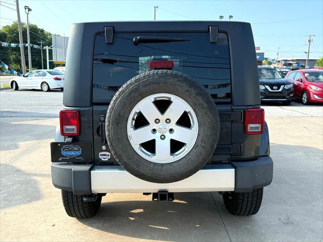used 2010 Jeep Wrangler Unlimited car, priced at $13,497