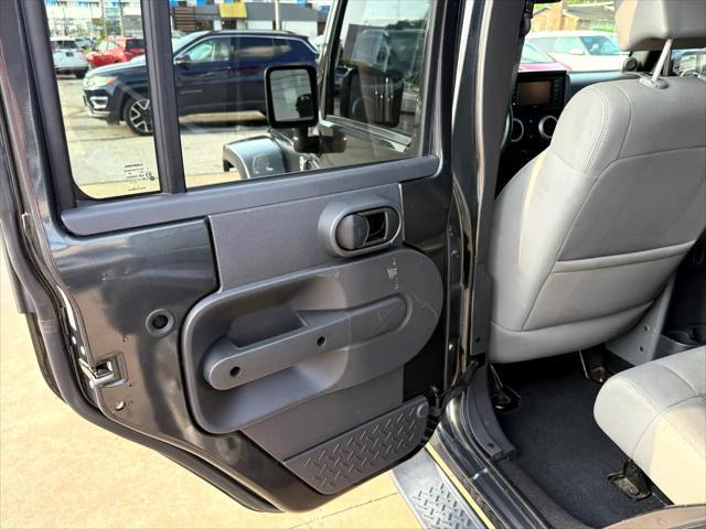 used 2010 Jeep Wrangler Unlimited car, priced at $13,497