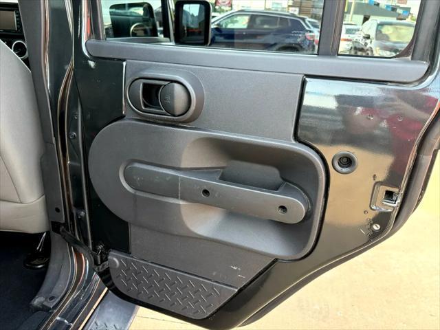 used 2010 Jeep Wrangler Unlimited car, priced at $13,497