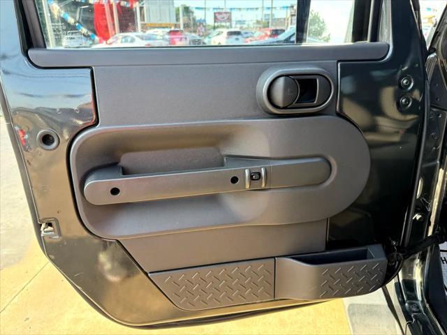 used 2010 Jeep Wrangler Unlimited car, priced at $13,497