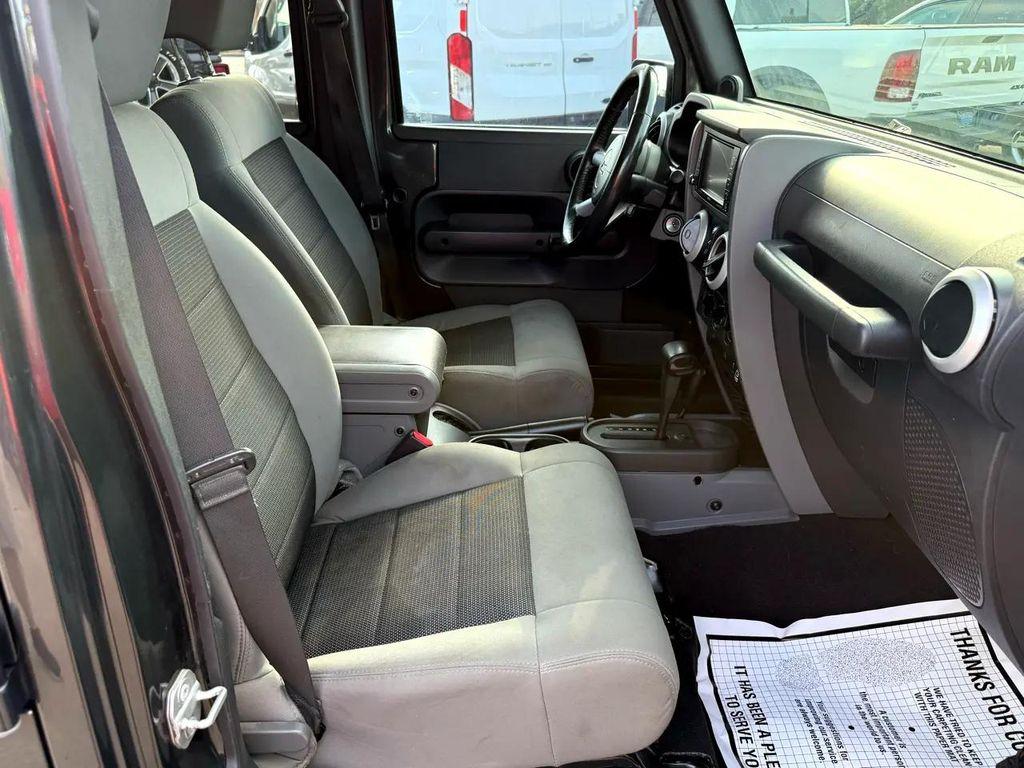 used 2010 Jeep Wrangler Unlimited car, priced at $13,497