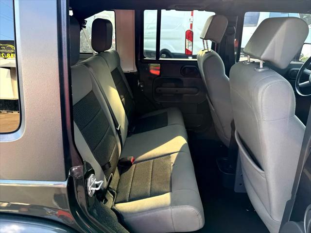used 2010 Jeep Wrangler Unlimited car, priced at $13,497