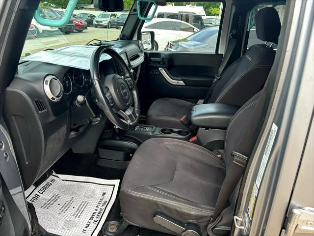 used 2013 Jeep Wrangler Unlimited car, priced at $12,997