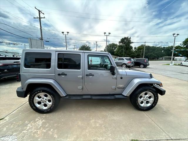 used 2013 Jeep Wrangler Unlimited car, priced at $12,997